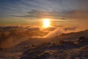 Sea of clouds as the sun rises over Moel Siabod